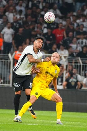 ISTANBUL, TURKEY - AUGUST 13: Emirhan Topcu (L) of Besiktas and Mick Van Buren (10) of Hradec Kralove during the UEFA Europa League 2026 27 third qualifying round second leg match between Besiktas JK and Hradec Kralove at Besiktas Park on August 13, 2026 in Istanbul, Turkey. Istanbul Besiktas Turkey Copyright: xSeskimphotox Besiktas-Hradec-1308 (94)