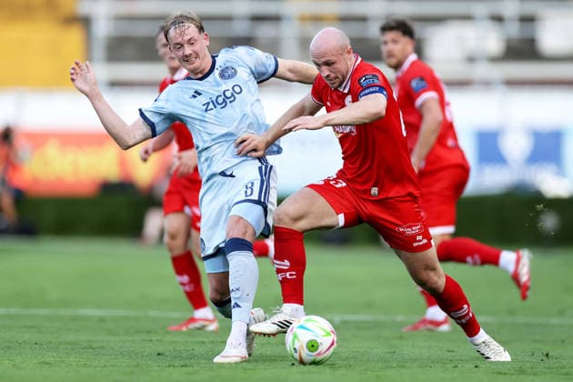 UEFA Conference League Third Qualifying Round Second Leg, Tolka Park, Dublin 13 8 2026 Shelbourne vs Ajax Ajax s Julian Brandt and Kerr McInroy of Shelbourne Julian Brandt and Kerr McInroy 13 8 2026  Copyright: xLaszloxGeczox LG_13-08-2026_003596