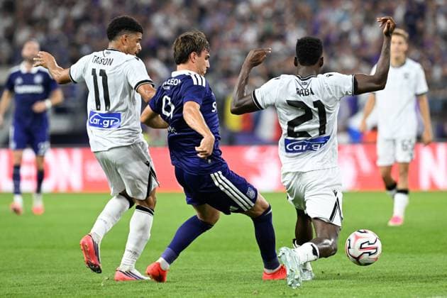 PAOK s Taison Barcellos Freda; Anderlecht s Mihajlo Cvetkovic and PAOK s Abdul Rahman Baba pictured in action during a game between Belgian RSC Anderlecht and Greek club PAOK , in Anderlecht, Brussels, Belgium, on Thursday 13 August 2026, a return leg game in the third qualifying round of the UEFA Europa League competition. RSCA won 0-1 the first leg. JILLxDELSAUX  x183318325x