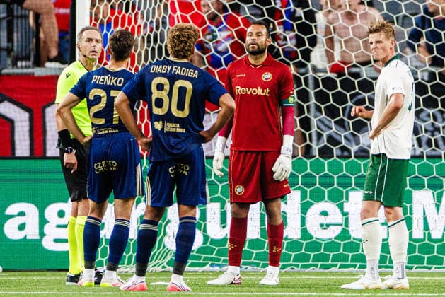 260813 referee Luca Pairetto and goalkeeper Warner Hahn of Hammarby <during the UEFA Conference League qualifying football match between Hammarby and Rakow on August 13, 2026 in Stockholm. Photo: Kenta Jönsson BILDBYRAN COP 210 KJ0361 fotboll football soccer fotball uefa conference league conference league hammarby rakow bbeng *** August 13, 2026: Referee Luca Pairetto and Hammarby goalkeeper Warner Hahn during the UEFA Conference League qualifying soccer match between Hammarby and Rakow on August 13, 2026 in Stockholm. Photo by Kenta Jönsson, BILDBYRAN COP 210 KJ0361. soccer, football, UEFA Conference League, Hammarby, Rakow, bbeng  Copyright: KENTAxJÖNSSON BB260813KJ062