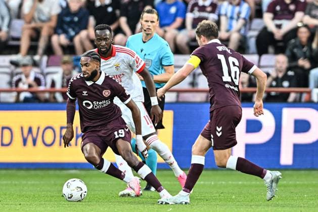 Heart of Midlothian v Benfica UEFA Europa League Sabri Guendouz of Heart of Midlothian battles for the ball with Dodi Lukebakio of Benfica during the UEFA Europa League Third Qualifying Round Second Leg match at Tynecastle Park, Edinburgh 13 08 2026 UK Newspapers OUT Copyright: xJamiexJohnstonx FIL-23768-0065