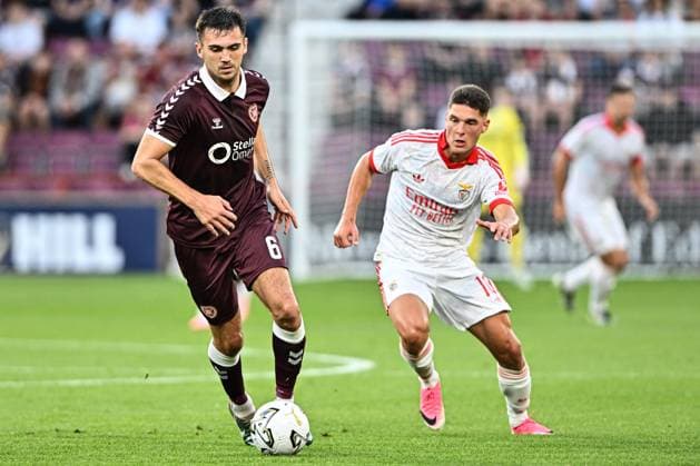 Heart of Midlothian v Benfica UEFA Europa League Oisin McEntee of Heart of Midlothian and Heorhiy Sudakov of Benfica during the UEFA Europa League Third Qualifying Round Second Leg match at Tynecastle Park, Edinburgh 13 08 2026 UK Newspapers OUT Copyright: xJamiexJohnstonx FIL-23768-0075