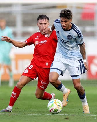 UEFA Conference League Third Qualifying Round Second Leg, Tolka Park, Dublin 13 8 2026 Shelbourne vs Ajax Ajax s Maher Carrizo and James Norris of Shelbourne Maher Carrizo and James Norris 13 8 2026  Copyright: xLaszloxGeczox LG_13-08-2026_004049