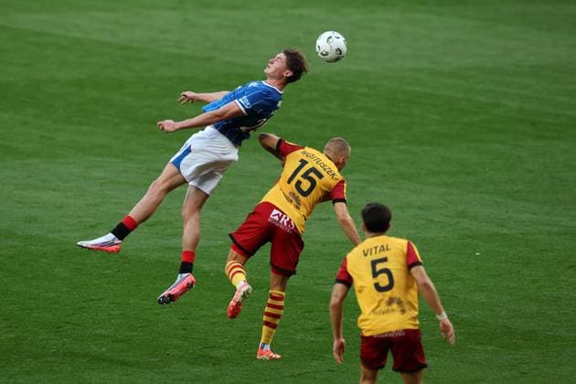 Ryan Naderi of Rangers jumps with Norbert Wojtuszek of Jagiellonia Bialystok during the Europa League qualifying match at Ibrox Stadium, Glasgow. Rangers v Jagiellonia Bialystok - UEFA Europa League 3rd Round Qualifying - Ibrox Stadium, Glasgow, Lanarkshire, Scotland, UK - 13 Aug 2026Glasgow Ibrox Lanarkshire United Kingdom EDITORIAL USE ONLY  Copyright: xO Rourke RangersxFC Shutterstockx 17070075o