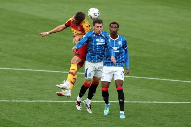 Dan Neil of Rangers jumps for the ball during the Europa League qualifying match at Ibrox Stadium, Glasgow. Rangers v Jagiellonia Bialystok - UEFA Europa League 3rd Round Qualifying - Ibrox Stadium, Glasgow, Lanarkshire, Scotland, UK - 13 Aug 2026Glasgow Ibrox Lanarkshire United Kingdom EDITORIAL USE ONLY  Copyright: xO Rourke RangersxFC Shutterstockx 17070075n