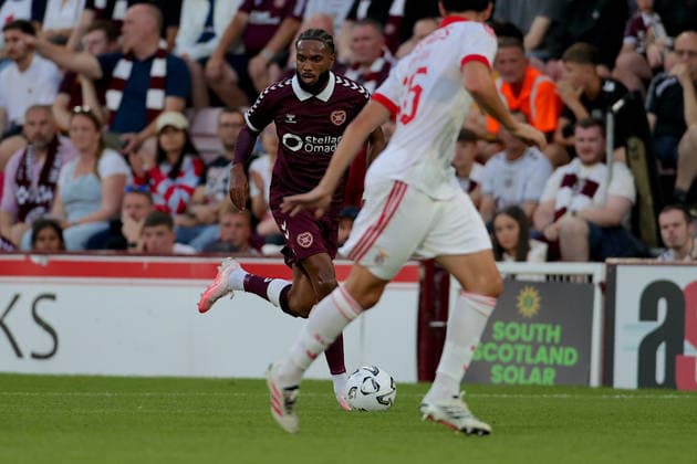 UK: Heart of Midlothian v Benfica - UEFA Europa League - 3rd Qualifying Round at Tynecastle Park in Edinburgh, Scotland on 13 August 2026 Heart of Midlothian v Benfica - UEFA Europa League - 3rd Qualifying Round at Tynecastle Park in Edinburgh, Scotland on 13 August 2026 Sabri Guendouz of Heart of Midlothian FC breaks forward Edinburgh Tynecastle Park Scotland Copyright: xJamesxChristiex