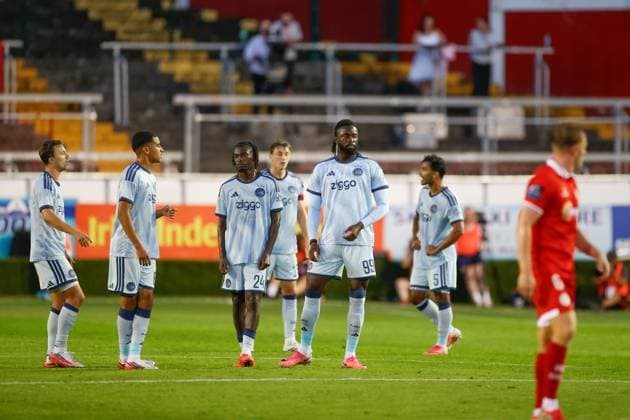DUBLIN , 13-08-2026, Tolka Park Stadium , season 2026 2027 , UEFA Conference League play-off football . Match between Shelbourne FC and Ajax, Picture shows Ajax player Abdellah Ouazane , Ajax player Jorthy Mokio and Ajax player Tolu Arokodare disappointed after the 2-2 Shelbourne - Ajax  x205683810x Copyright: