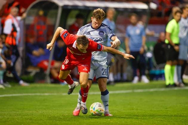 DUBLIN , 13-08-2026, Tolka Park Stadium , season 2026 2027 , UEFA Conference League play-off football . Match between Shelbourne FC and Ajax, Picture shows Ajax player Oliver Edvardsen and Shelbourne player James Norris Shelbourne - Ajax  x205684034x Copyright: