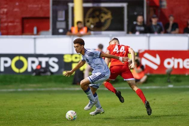 DUBLIN , 13-08-2026, Tolka Park Stadium , season 2026 2027 , UEFA Conference League play-off football . Match between Shelbourne FC and Ajax, Picture shows Ajax player Aaron Bouwman and Shelbourne player Daniel Ring Shelbourne - Ajax  x205684115x Copyright: