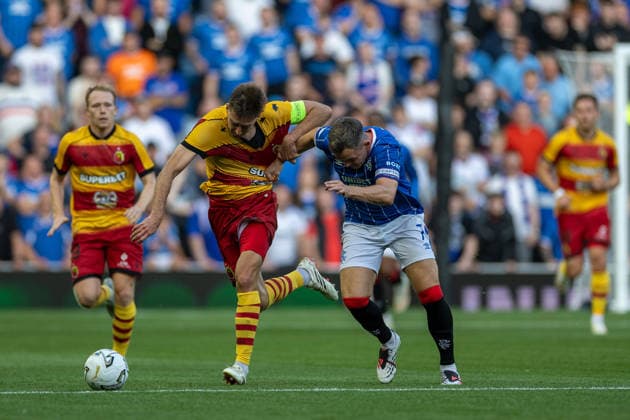 RECORD DATE NOT STATED 12th August 2026; Ibrox Stadium, Glasgow, Scotland; UEFA Europa League Qualifier Football, Rangers versus Jagiellonia Bialystok; Taras Romanczuk of Jagiellonia Bialystok and Lawrence Shankland of Rangers challenge for the ball VagelisxGeorgariou