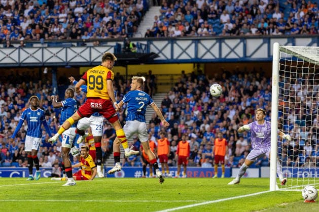 RECORD DATE NOT STATED 12th August 2026; Ibrox Stadium, Glasgow, Scotland; UEFA Europa League Qualifier Football, Rangers versus Jagiellonia Bialystok; Nik Prelec of Jagiellonia Bialystok heads the ball and scores past Ivor Pandur of Rangers in the 65th minute to make it 1-1 VagelisxGeorgariou