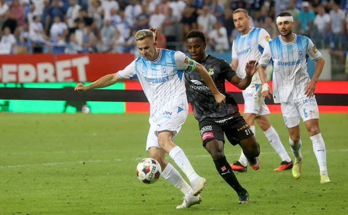 13.08.2026 Craiova(Romania) Universitaea Craiova UCraiova-KuPS Kuopio Uefa Europa League third qualifyng round men football Nicusor Bancu (C) Universitaea Craiova UCraiova,Joslyn Luyeye-Lutumba(2L) KuPS :