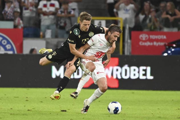 IPA87455937 - Kristoffer Zachariassen (Fer) and Michal Sacek (Gor) during the UEFA Europa League match between Gornik Zabrze and Ferencvaros at Arena Zabrze in Zabrze, Poland, on August 13, 2026  Copyright: xMichalxDubiel IPAxSportx xx 87455937