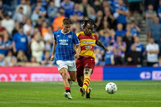 RECORD DATE NOT STATED 12th August 2026; Ibrox Stadium, Glasgow, Scotland; UEFA Europa League Qualifier Football, Rangers versus Jagiellonia Bialystok; Cammy Devlin of Rangers and Jeremey Agbonifo of Jagiellonia Bialystok challenge for the ball VagelisxGeorgariou