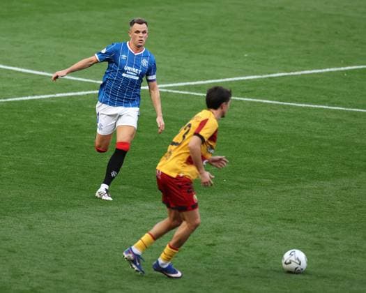 Rangers captain Lawrence Shankland and Guilherme Montoia of Jagiellonia Bialystok during the Europa League qualifying match at Ibrox Stadium, Glasgow. Rangers v Jagiellonia Bialystok - UEFA Europa League 3rd Round Qualifying - Ibrox Stadium, Glasgow, Lanarkshire, Scotland, UK - 13 Aug 2026Glasgow Ibrox Lanarkshire United Kingdom EDITORIAL USE ONLY  Copyright: xO Rourke RangersxFC Shutterstockx 17070075cp