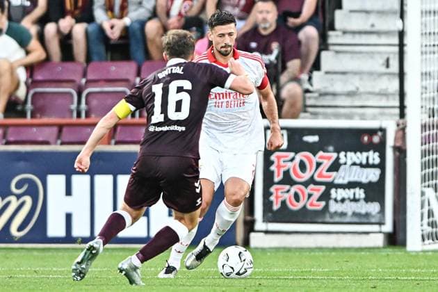 Heart of Midlothian v Benfica UEFA Europa League Blair Spittal of Heart of Midlothian presses Clement Lenglet of Benfica during the UEFA Europa League Third Qualifying Round Second Leg match at Tynecastle Park, Edinburgh 13 08 2026 UK Newspapers OUT Copyright: xJamiexJohnstonx FIL-23768-0181