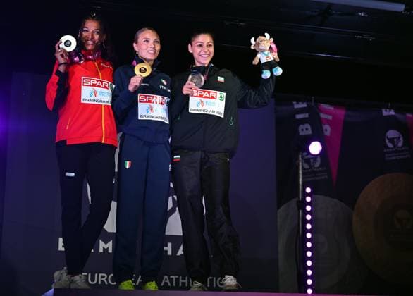 Belgian Saliyya Guisse,Italia s Daryia Derkach and Aleksandra Nacheva celebrates on the podium of the women s triple jump event at the European Athletics Championships (August 10-18) in Birmingham, United Kingdom, on Thursday 13 August 2026. ERICxLALMAND  x183327157x