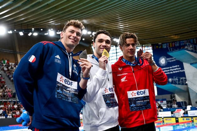 Maxime Grousset of France, silver, Kristof Milak of Hungary, gold and new european record, Noe Ponti of Switzerland, bronze show the medals after competing in the swimming 100m Butterfly Men Final during the European Aquatics Championships at the Olympic Aquatic Center in Paris (France), August 13, 2026. Andrea Staccioli Deepbluemedia Insidefoto