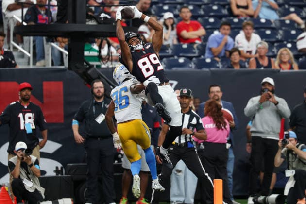 HOUSTON, TX - AUGUST 13: Wide Receiver Jared Wayne of the Houston Texans leaps for a touchdown reception over cornerback Avery Smith of the Los Angeles Chargers during the NFL, American Football Herren, USA preseason game between Houston Texans and Los Angeles Chargers on August 13, 2026, at Reliant Stadium in Houston, TX. (Photo by David Buono Icon Sportswire) NFL: AUG 13 Chargers at Texans EDITORIAL USE ONLY Icon260813012