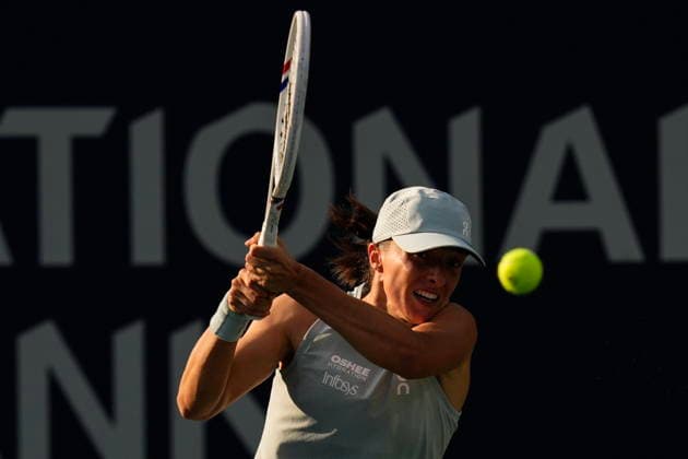 August 13, 2026, Toronto, On, CAN: Poland s Iga Swiatek hits a return to Kazakhstan s Elena Rybakina during National Bank Open final tennis action, in Toronto, Thursday, Aug. 13, 2026. Canada News - August 13, 2026  - ZUMAc35_ 20260813_zaf_c35_126 Copyright: xChrisxYoungx