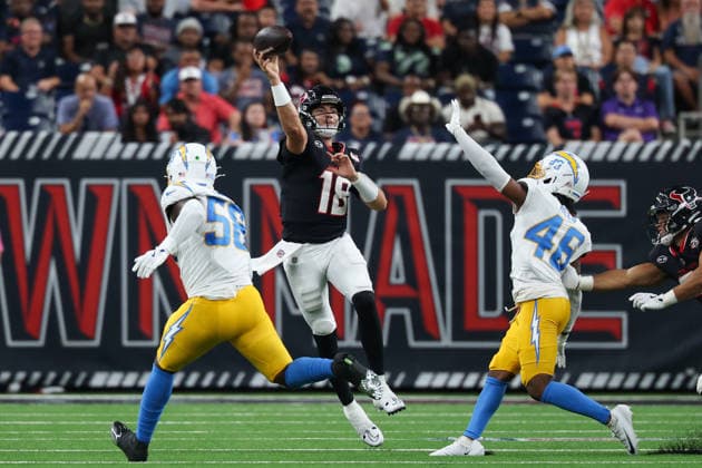 HOUSTON, TX - AUGUST 13: Quarterback Graham Mertz of the Houston Texans passes the ball over cornerback Nikko Reed of the Los Angeles Chargers during the NFL, American Football Herren, USA preseason game between Houston Texans and Los Angeles Chargers on August 13, 2026, at Reliant Stadium in Houston, TX. (Photo by David Buono Icon Sportswire) NFL: AUG 13 Chargers at Texans EDITORIAL USE ONLY Icon260813021