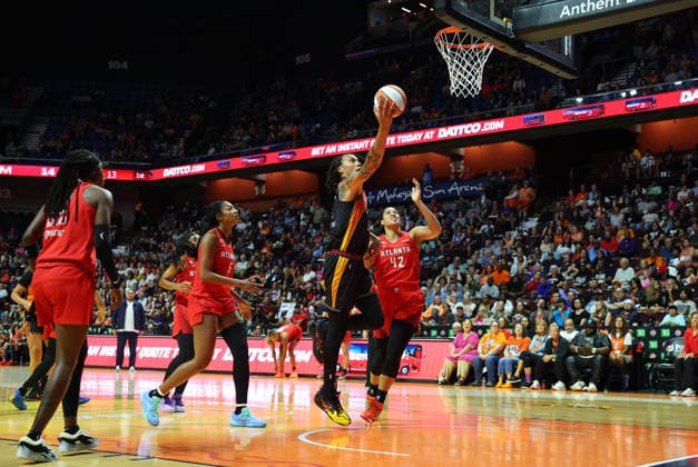 UNCASVILLE, CT - AUGUST 13: Brittney Griner 42 of the Connecticut Sun drives to the basket against Brionna Jones 42 of the Atlanta Dream during the WNBA, Basketball Damen, USA game between Atlanta Dream and Connecticut Sun on August 13, 2026, at Mohegan Sun Arena in Uncasville, CT. (Photo by M. Anthony Nesmith Icon Sportswire) WNBA: AUG 13 Atlanta Dream at Connecticut Sun EDITORIAL USE ONLY Icon26081336