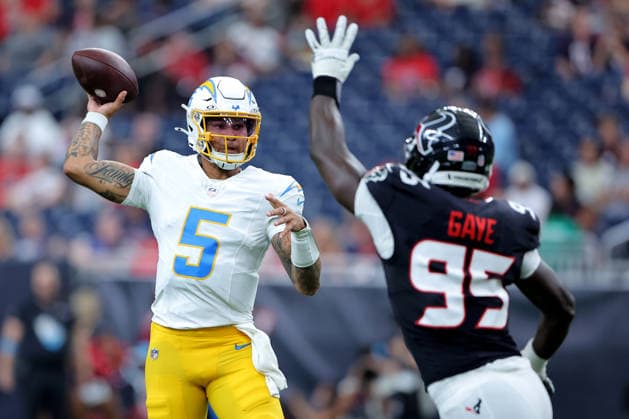 August 13, 2026, Houston, Texas, U.S: Los Angeles Chargers quarterback Trey Lance (5) reaches back to pass against Houston Texans defensive end Ali Gaye (95) during the first quarter at Reliant Stadium in Houston, TX on August 13, 2026. NFL, American Football Herren, USA 2026 - Los Angeles Chargers Vs Houston Texans  - ZUMAw137 20260813_aap_w137_032 Copyright: xErikxWilliamsx