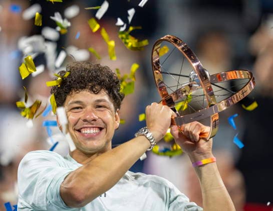 August 13, 2026, Montreal, Pq, Canada: Ben Shelton of the United States hoists the trophy following his win over compatriot Brandon Nakashima during final tennis action at the National Bank Open in Montreal on Thursday, Aug. 13, 2026. Canada News - August 13, 2026  - ZUMAc35_ 20260813_zaf_c35_147 Copyright: xChristinnexMuschix