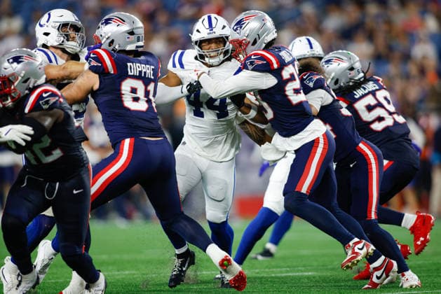 August 13, 2026; Foxborough, Massachusetts, USA; Indianapolis Colts linebacker Tahj Chambers (44) tries to muscle past New England Patriots safety John Saunders Jr. (23) in an NFL, American Football Herren, USA preseason game at Gillette Stadium. (c) CSM - ZUMAc04_ 20260813_zma_c04_082 Copyright: xBurtxGranofskyx
