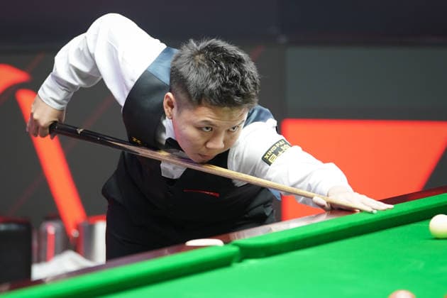 TAIYUAN, CHINA - AUGUST 14: Zhou Yuelong of China plays a shot in the Quarterfinal match against David Gilbert of England on day 7 of the 2026 World Snooker Tour China Open at Taiyuan Binhe Sports Center on August 14, 2026 in Taiyuan, Shanxi Province of China.  Copyright: xTaixChengzhex 111659923291