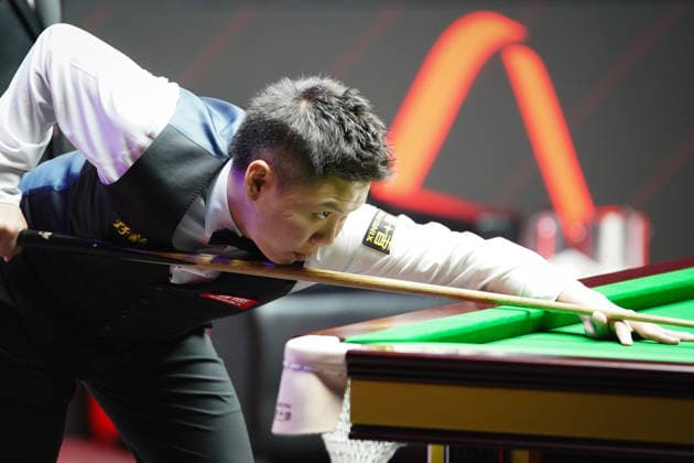 TAIYUAN, CHINA - AUGUST 14: Zhou Yuelong of China plays a shot in the Quarterfinal match against David Gilbert of England on day 7 of the 2026 World Snooker Tour China Open at Taiyuan Binhe Sports Center on August 14, 2026 in Taiyuan, Shanxi Province of China.  Copyright: xTaixChengzhex 111659923292
