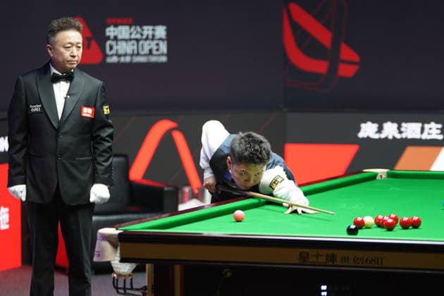 TAIYUAN, CHINA - AUGUST 14: Zhou Yuelong of China plays a shot in the Quarterfinal match against David Gilbert of England on day 7 of the 2026 World Snooker Tour China Open at Taiyuan Binhe Sports Center on August 14, 2026 in Taiyuan, Shanxi Province of China.  Copyright: xTaixChengzhex 111659923294