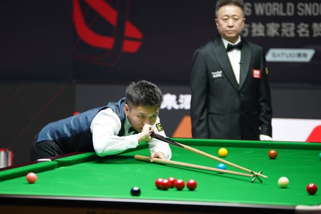 TAIYUAN, CHINA - AUGUST 14: Zhou Yuelong of China plays a shot in the Quarterfinal match against David Gilbert of England on day 7 of the 2026 World Snooker Tour China Open at Taiyuan Binhe Sports Center on August 14, 2026 in Taiyuan, Shanxi Province of China.  Copyright: xTaixChengzhex 111659923297