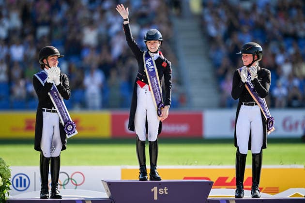 260814 Cathrine Laudrup-Dufour of Denmark celebrates second place, Charlotte Fry of Great Britain first place and Katharina Hemmer of Germany celebrates third place on the podium after competing in the Dressage Grand Prix Special during day 4 of the 2026 FEI World Championships on August 14, 2026 in Aachen. Photo: Emma Wallskog BILDBYRAN kod EW EW0682 ridsport equestrian rid-vm 2026 2026 fei world championships bbeng ridsport-vm dressage dressyr jubel *** August 14, 2026: Cathrine Laudrup Dufour of Denmark celebrates second place, Charlotte Fry of Great Britain celebrates first place, and Katharina Hemmer of Germany celebrates third place on the podium after competing in the Dressage Grand Prix Special on Day 4 of the 2026 FEI World Championships on August 14, 2026 in Aachen. Photo by Emma Wallskog. BILDBYRAN code EW EW0682 equestrian sports 2026 World Championships 2026 FEI World Championships BBENG equestrian sports World Championships dressage celebration  Copyright: EMMAxWALLSKOG BB260814EW098