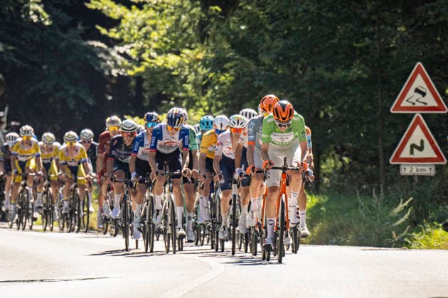 Ben Turner of Britain (Netcompany INEOS), right in green, competes druring the second stage of the Czech Tour 2026 cycling race Mlada Boleslav - Jested, on August 14, 2026, Liberec, Czech Republic. (CTKxPhoto RadekxPetrasek) CTKPhotoP2026081405746  CTKPhotoP2026081405746