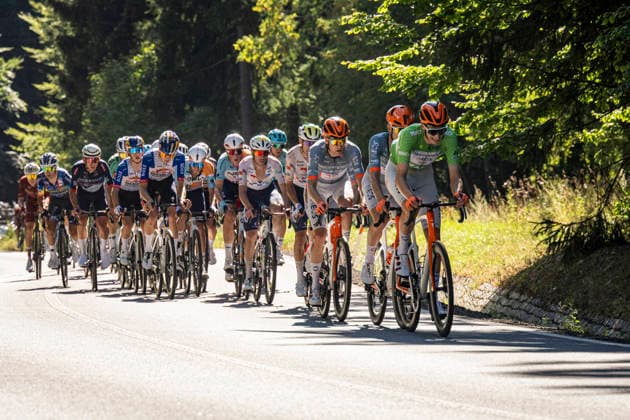 Ben Turner of Britain (Netcompany INEOS), right in green, competes druring the second stage of the Czech Tour 2026 cycling race Mlada Boleslav - Jested, on August 14, 2026, Liberec, Czech Republic. (CTKxPhoto RadekxPetrasek) CTKPhotoP2026081405748  CTKPhotoP2026081405748