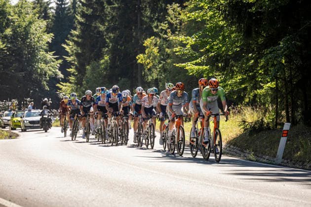 Ben Turner of Britain (Netcompany INEOS), right in green, competes druring the second stage of the Czech Tour 2026 cycling race Mlada Boleslav - Jested, on August 14, 2026, Liberec, Czech Republic. (CTKxPhoto RadekxPetrasek) CTKPhotoP2026081405753  CTKPhotoP2026081405753
