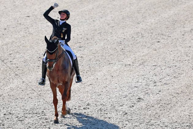 3. Platz und Bronze an Katharina Hemmer (GER, Deutschland, Germany) mit Pferd Denoix PCH, Siegerjubel, Siegeerfaust, Emotion, Dressur, FEI Dressage World Championship, WM, Weltmeisterschaft MEGGLE-Preis, Grand Prix Special, Einzelwertung , AACHEN - FEI World Championships 2026, Weltfest des Pferdesports, Reitsport Weltmeisterschaft 2026, Aachen 2026, Welcome Home 2026, Aachener Soers, 11. bis 23. August 2026, Reitsport, 14.08.2026, Aachen Aachener Soers Deutschland *** 3rd place and bronze for Katharina Hemmer (GER, Germany) riding Denoix (PCH); victory celebration, victory fist, emotion, dressage, FEI Dressage World Championship MEGGLE Prize, Grand Prix Special, individual competition, Aachen FEI World Championships 2026, World Equestrian Festival, 2026 World Equestrian Championships, Aachen 2026, Welcome Home 2026, Aachen Soers, August 11–23, 2026, Equestrian sports, August 14, 2026, Aachen, Aachener Soers, Germany