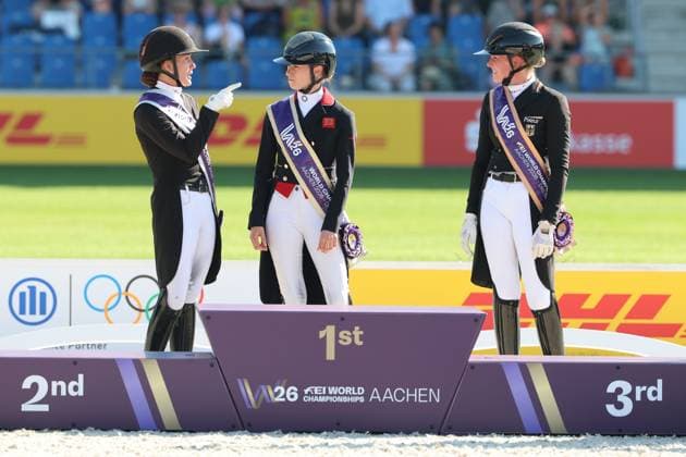 Siegerehrung: 1. Platz Charlotte Fry (GBR, Grossbritanien, Great Britain, Vereinigtes Königreich) Pferd Glamourdale, 2. Platz Cathrine Laudrup-Dufour (DEN, Dänemark, Denmark) Pferd Mount St John Freestyle, 3. Platz, Bronze, Katharina Hemmer (GER, Deutschland, Germany), Denoix PCH, Dressur, FEI Dressage World Championship, WM, Weltmeisterschaft MEGGLE-Preis, Grand Prix Special, Einzelwertung , AACHEN - FEI World Championships 2026, Weltfest des Pferdesports, Reitsport Weltmeisterschaft 2026, Aachen 2026, Welcome Home 2026, Aachener Soers, 11. bis 23. August 2026, Reitsport, 14.08.2026, Aachen Aachener Soers Deutschland *** Awards Ceremony: 1st Place Charlotte Fry GBR, Great Britain, United Kingdom, Horse: Glamourdale; 2nd Place Cathrine Laudrup Dufour DEN, Denmark, Horse: Mount St John Freestyle; 3rd Place, Bronze, Katharina Hemmer GER, Germany, Denoix PCH, Dressage, FEI Dressage World Championship MEGGLE Prize, Grand Prix Special, Individual Classification, AACHEN FEI World Championships 2026, World Festival of Equestrian Sports, 2026 Equestrian World Championships, Aachen 2026, Welcome Home 2026, Aachen Soers, August 11–23, 2026, Equestrian Sports, August 14, 2026, Aachen Soers, Germany