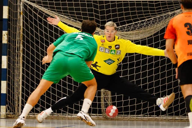 HANDBALL - Graz vs Algeria, test match GRAZ,AUSTRIA,14.AUG.26 - HANDBALL - HSG Graz vs Algeria, test match. Image shows Bounab Hani Abed Rafik (Algeria) and Thomas Eichberger (Graz).  GEPAxpictures xJamesxDoak