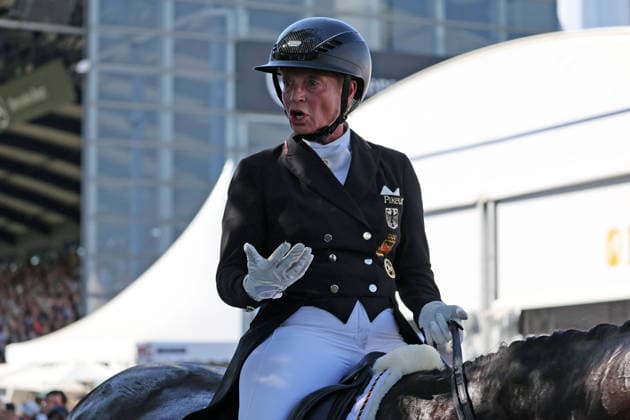 4. Platz, gefrustete Isabell Werth (GER, Deutschland, Germany) mit Pferd Wendy de Fontaine, Emotion, Frust, Enttäuschung nach dem Ritt, Dressur, FEI Dressage World Championship, WM, Weltmeisterschaft MEGGLE-Preis, Grand Prix Special, Einzelwertung , AACHEN - FEI World Championships 2026, Weltfest des Pferdesports, Reitsport Weltmeisterschaft 2026, Aachen 2026, Welcome Home 2026, Aachener Soers, 11. bis 23. August 2026, Reitsport, 14.08.2026, Aachen Aachener Soers Deutschland *** 4th place, a frustrated Isabell Werth (GER, Germany) riding Wendy de Fontaine; emotion, frustration, disappointment after the ride; dressage; FEI Dressage World Championship MEGGLE Prize; Grand Prix Special; individual standings, AACHEN FEI World Championships 2026, World Equestrian Festival, 2026 World Equestrian Championships, Aachen 2026, Welcome Home 2026, Aachen Soers, August 11–23, 2026, Equestrian Sports, August 14, 2026, Aachen Soers, Germany