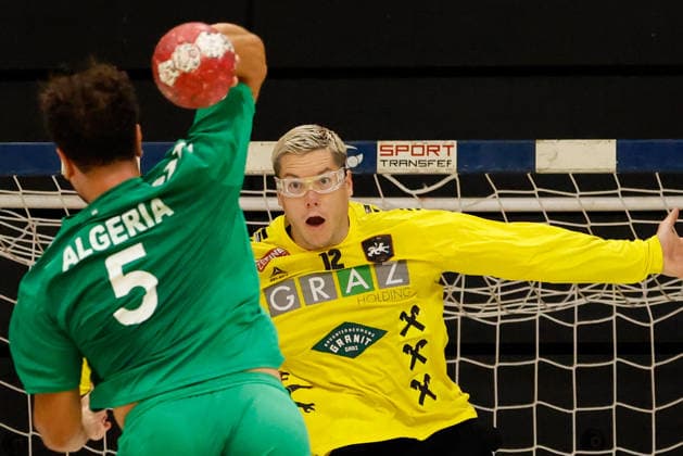 HANDBALL - Graz vs Algeria, test match GRAZ,AUSTRIA,14.AUG.26 - HANDBALL - HSG Graz vs Algeria, test match. Image shows Bounab Hani Abed Rafik (Algeria) and Thomas Eichberger (Graz).  GEPAxpictures xJamesxDoak