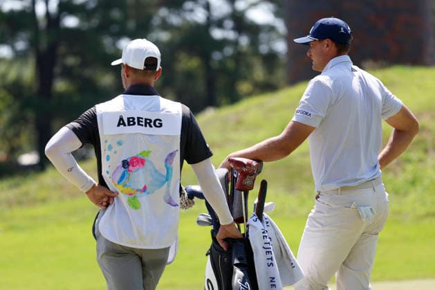 MEMPHIS, TN - AUGUST 14: Ludvig Aberg of Sweden stands with his caddie who is wearing a bib designed by patients at St. Jude ChildrenÕs Hospital during the second round of the FedEx St. Jude Championship, August 14, 2026, at TPC Southwind in Memphis, Tennessee. (Photo by Matthew Maxey Icon Sportswire) GOLF: AUG 14 PGA, Golf Herren FedEx St. Jude Championship EDITORIAL USE ONLY Icon260814062
