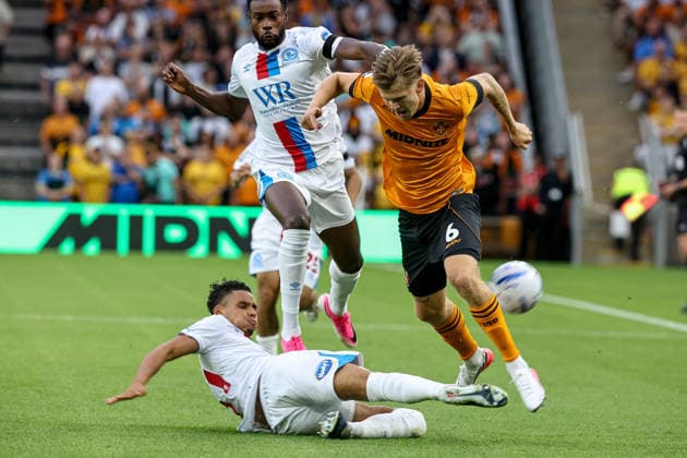 Wolverhampton Wanderers v Blackburn Rovers, EFL Sky Bet Championship Wolverhampton Wanderers defender David Moller Wolfe (6) tackled during the EFL Sky Bet Championship match between Wolverhampton Wanderers and Blackburn Rovers at Molineux, Wolverhampton, UK on 14 August 2026. Wolverhampton Molineux West Midlands UK Editorial use only DataCo restrictions apply See www.football-dataco.com , Copyright: xManjitxNarotrax PSI-24683-0009