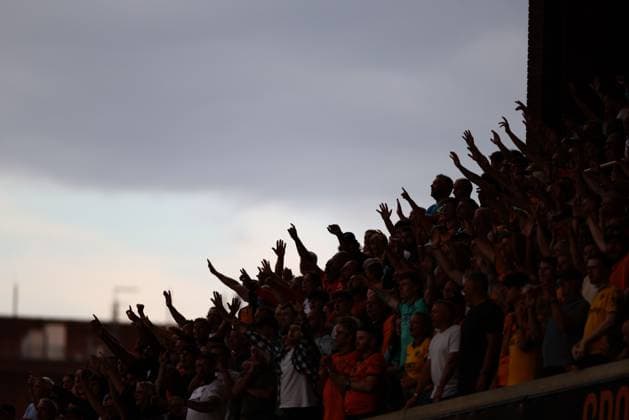 Wolverhampton Wanderers fans cheer their team on Wolverhampton Wanderers v Blackburn Rovers, EFL Sky Bet Championship, Football, Molineux, Wolverhampton, UK - 14 Aug 2026Wolverhampton Molineux United Kingdom EDITORIAL USE ONLY No use with unauthorised audio, video, data, fixture lists, club league logos or live services. Online in-match use limited to 120 images, no video emulation. No use in betting, games or single club league player publications.  Copyright: xKieranxMcManus Shutterstockx 17070083s