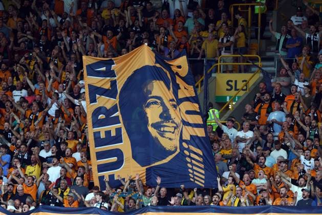 Wolverhampton Wanderers fans cheer their team on with a flag with Raul JimÃ nez Wolverhampton Wanderers v Blackburn Rovers, EFL Sky Bet Championship, Football, Molineux, Wolverhampton, UK - 14 Aug 2026Wolverhampton Molineux United Kingdom EDITORIAL USE ONLY No use with unauthorised audio, video, data, fixture lists, club league logos or live services. Online in-match use limited to 120 images, no video emulation. No use in betting, games or single club league player publications.  Copyright: xKieranxMcManus Shutterstockx 17070083u
