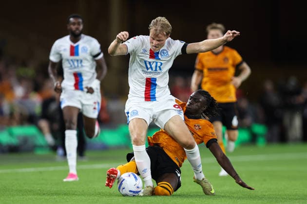 Wolverhampton, England, 14th August 2026. Mateus ManÃ of Wolverhampton Wanderers tackles Andri GuÃ°johnsen of Blackburn Rovers during the Wolverhampton Wanderers vs Blackburn Rovers Sky Bet Championship match at Molineux, Wolverhampton. Picture credit should read: Gareth Evans Sportimage EDITORIAL USE ONLY. No use with unauthorised audio, video, data, fixture lists, club league logos or live services. Online in-match use limited to 120 images, no video emulation. No use in betting, games or single club league player publications. SPI_060_GE_WOL_vs_BBR SPI-4907-0059