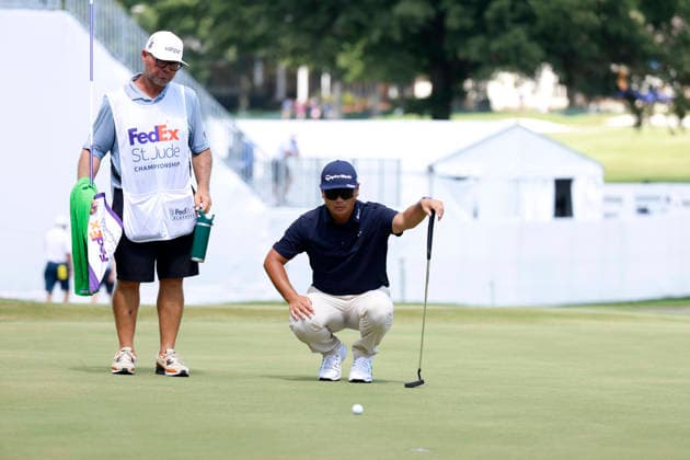 MEMPHIS, TN - AUGUST 14: Ryo Hisatsune of Japan squats to line up a putt on No. 17 during the second round of the FedEx St. Jude Championship, August 14, 2026, at TPC Southwind in Memphis, Tennessee. (Photo by Matthew Maxey Icon Sportswire) GOLF: AUG 14 PGA, Golf Herren FedEx St. Jude Championship EDITORIAL USE ONLY Icon260814092