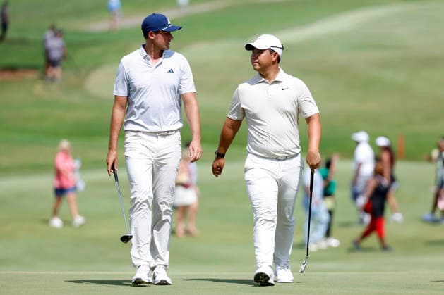 MEMPHIS, TN - AUGUST 14: Ludvig Aberg of Sweden and Tom Kim of South Korea chat as they walk onto the No. 17 green during the second round of the FedEx St. Jude Championship, August 14, 2026, at TPC Southwind in Memphis, Tennessee. (Photo by Matthew Maxey Icon Sportswire) GOLF: AUG 14 PGA, Golf Herren FedEx St. Jude Championship EDITORIAL USE ONLY Icon260814100