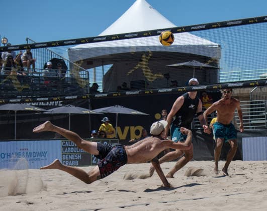 August 14, 2026, Manhattan Beach, California, USA: CODY CALDWELL digs the ball during a second round match at the Manhattan Beach Open. Manhattan Beach USA - ZUMAl183 20260814_znp_l183_023 Copyright: xJasenxLaksx